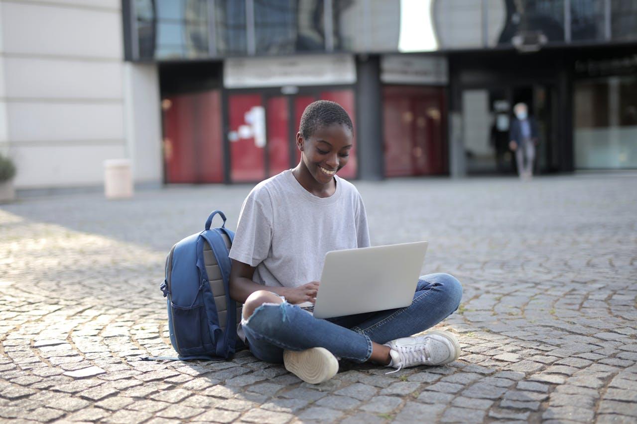 Portrait smiling african american entrepreneur man browsing management information